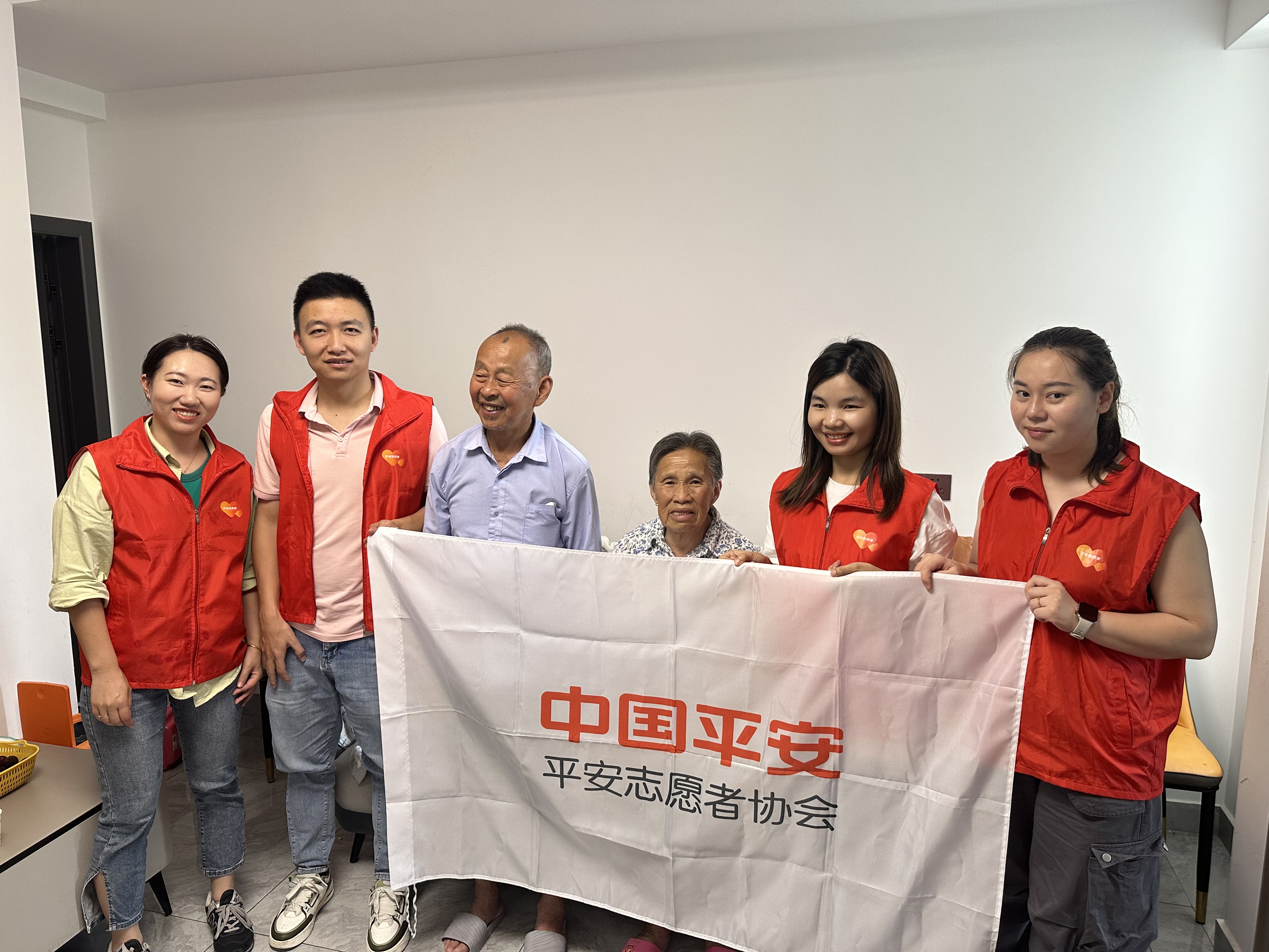 平安产险三明中心支公司：粽香暖孤巢，食暖留守心 (1).jpg